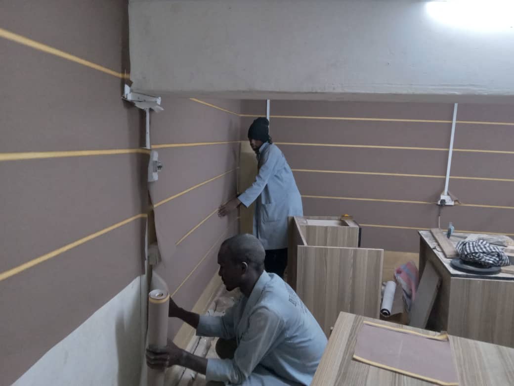 Our crew hanging feature wallpaper on site