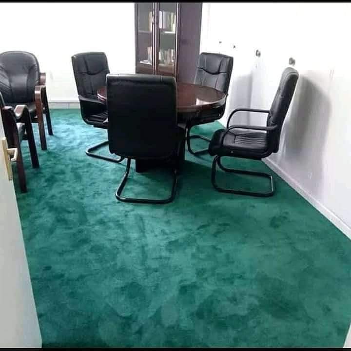 Green contract carpet fitted in a boardroom